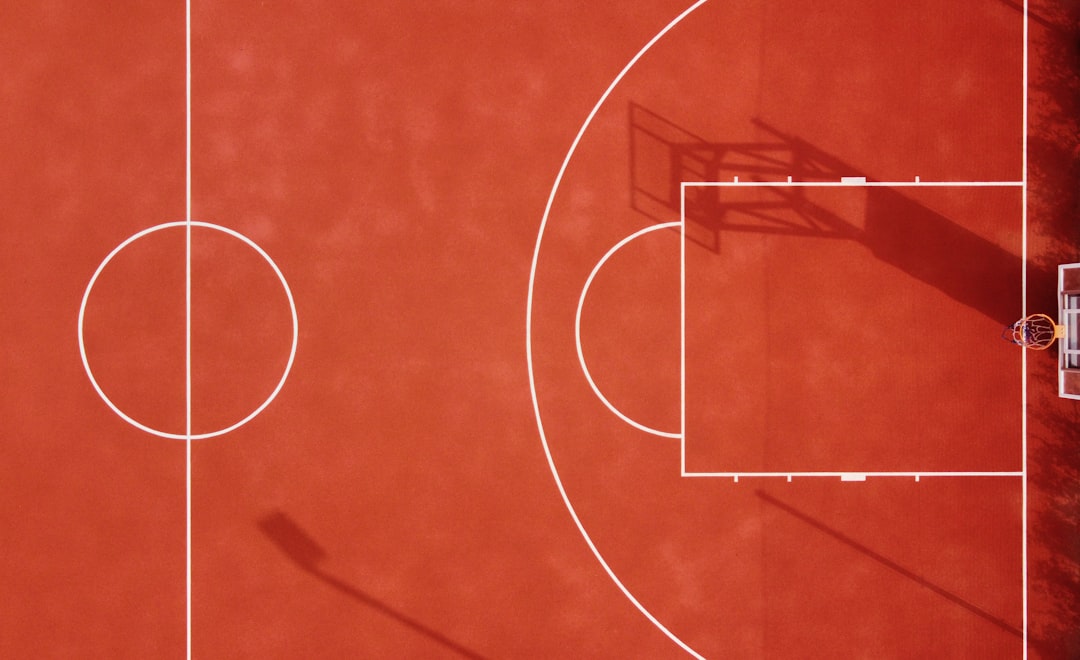 basketball tournament strategy cover with clipboard, bracket board, stopwatch, and sideline notes
