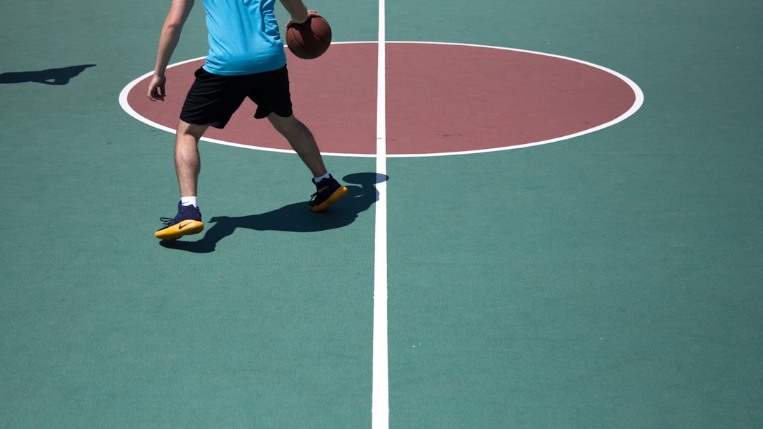 Basketball Tournament Planning cover image with bracket board, stopwatch, clipboard, and court map