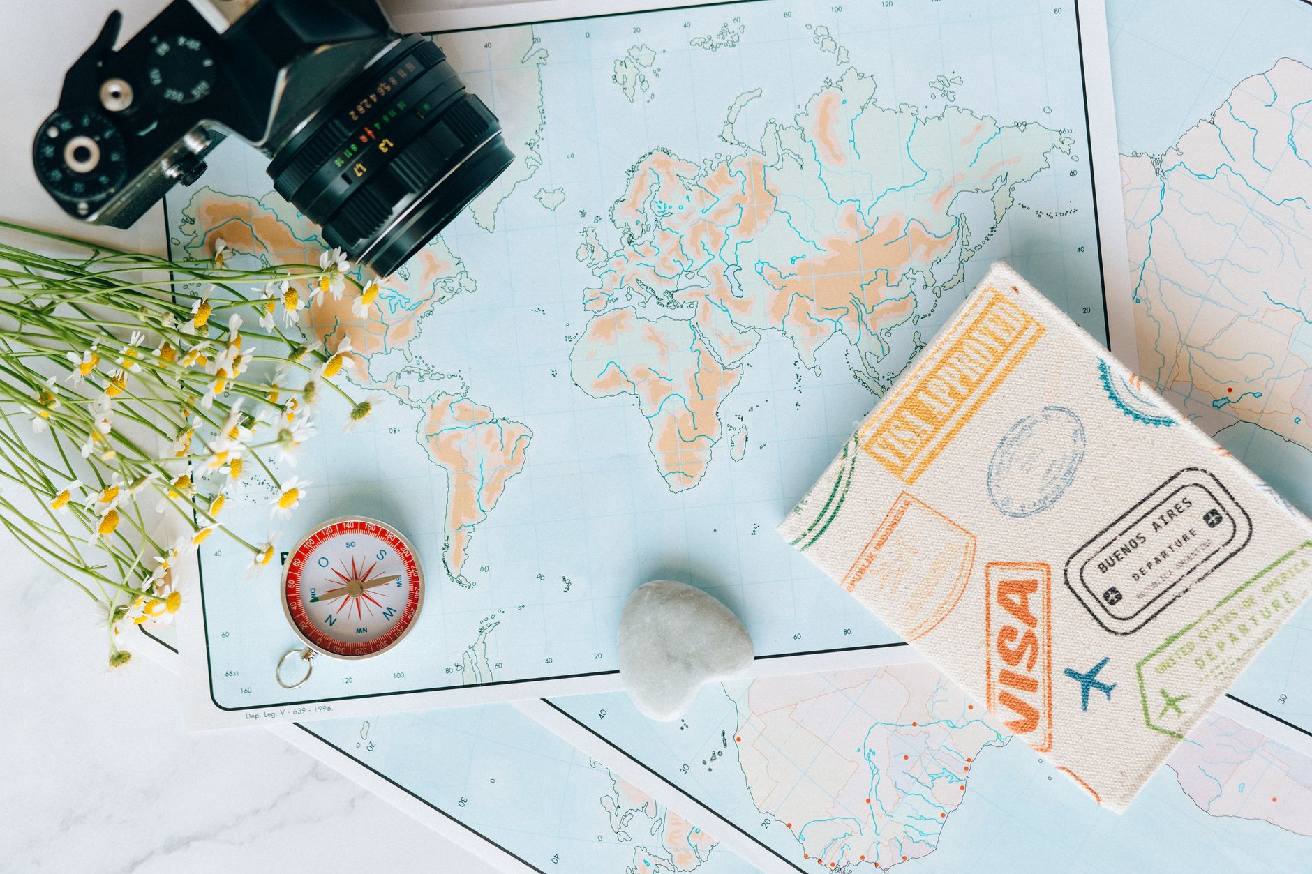 FIFA World Cup travel guide cover with stadium, passport, train map, and match ticket