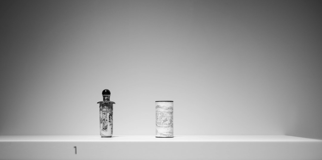 Cover image for sports hydration strategy across seasons and sports, featuring bottles, a stopwatch, and a simple field graphic
